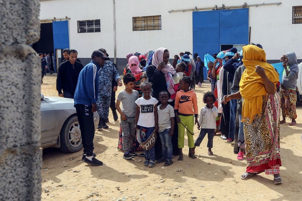 Migrants gather to meet United Nations Secretary-General Antonio Guterres (unseen) during his visit to Ain Zara detention centre for migrants in the Libyan capital Tripoli on April 4, 2019. u00e2u20acu201d AFP pic