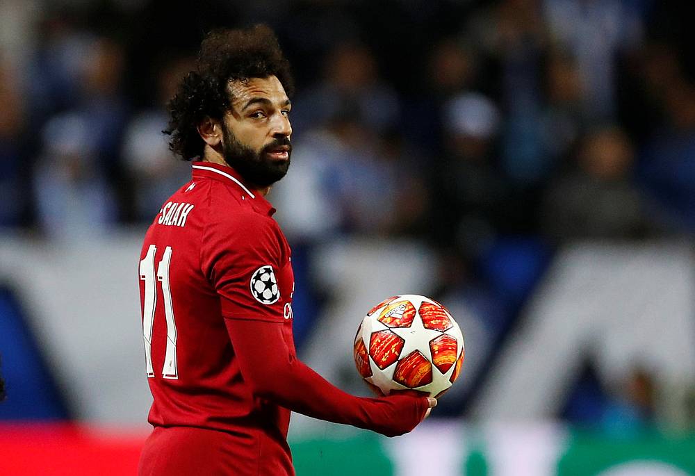 Liverpool's Mohamed Salah with the match ball after the Champions League quarter-final second leg with FC Porto at Porto April 17, 2019. u00e2u20acu201d Reuters pic