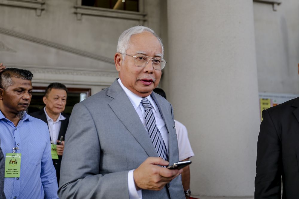 Datuk Seri Najib Razak speaks to reporters outside the Kuala Lumpur Court Complex April 16, 2019. u00e2u20acu201d Picture by Firdaus Latif