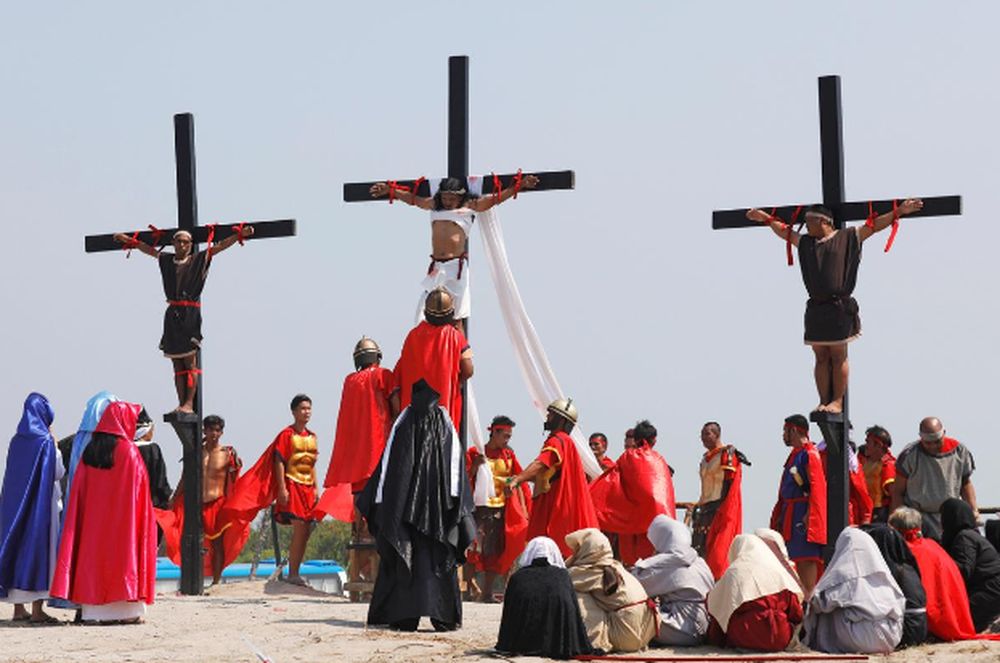 Filipino devotees are nailed on wooden crosses during a crucifixion re-enactment on Good Friday, in San Fernando City, Pampanga province, Philippines, April 19, 2019. u00e2u20acu201d Reuters pic