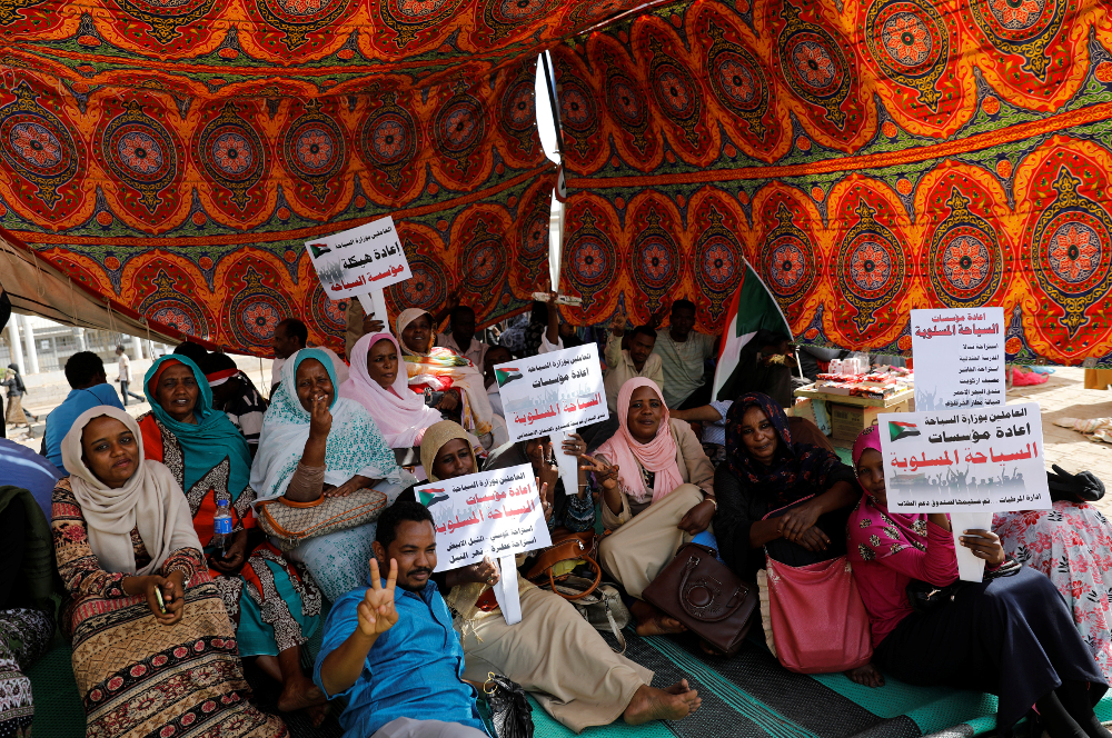 Sudanese protesters gather under a tent to protect themselves from the sun as they sit-in outside the defense ministry compound in Khartoum April 25, 2019. u00e2u20acu201d Reuters pic