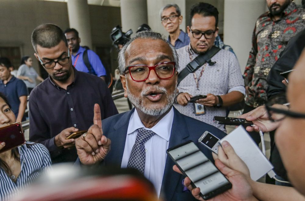 Lawyer Tan Sri Muhammad Shafee Abdullah speaks to reporters at the Kuala Lumpur Court Complex April 15, 2019. u00e2u20acu201d Picture by Firdaus Latif
