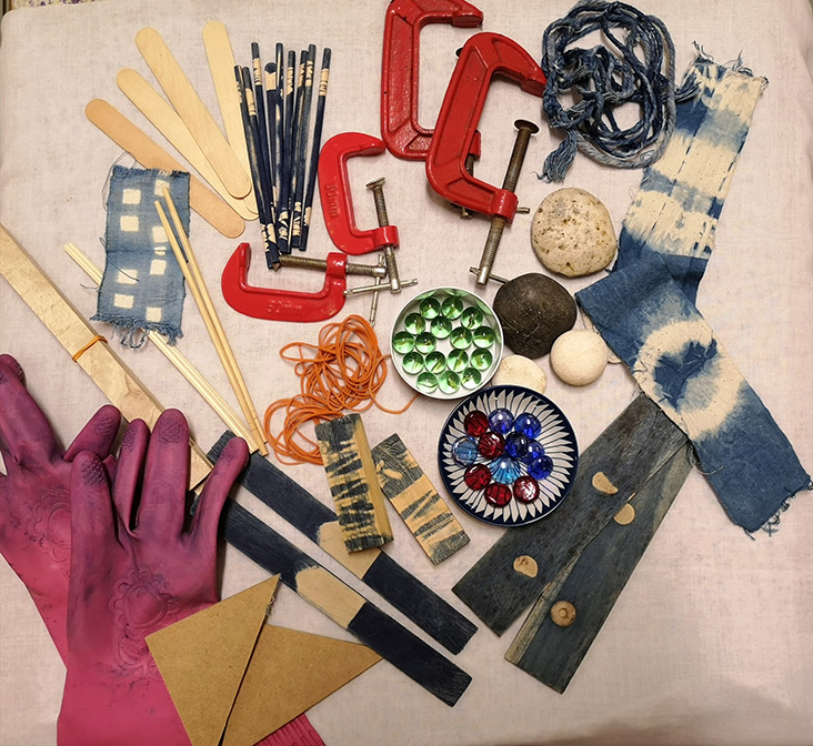 Masitah uses various items like chopsticks, marbles and more to create the distinctive 'shibori' patterns.