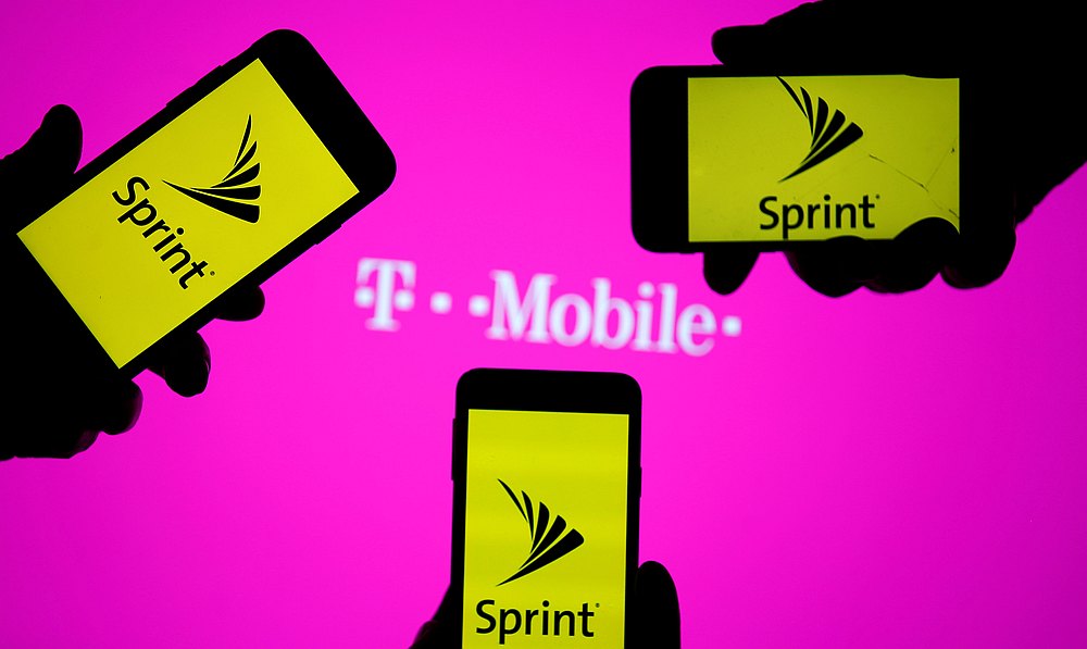 Smartphones with Sprint logo are seen in front of a screen projection of T-mobile logo, in this picture illustration taken April 30, 2018. u00e2u20acu201d Reuters pic