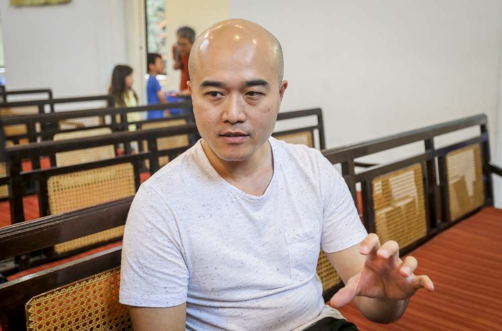 The tower’s architect Issey Chong speaks to Malay Mail at the St Andrew's Presbyterian Church in Kuala Lumpur April 7, 2019.