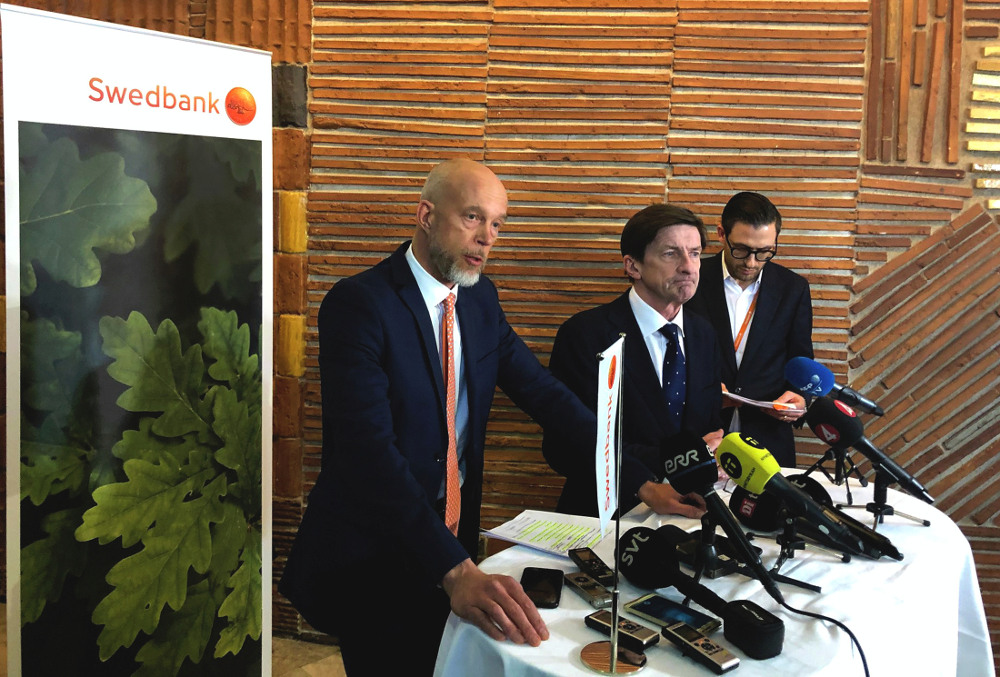 Swedbank Acting CEO Anders Karlsson and Chairman of the Board Lars Idermark attend a news conference in Stockholm March 28, 2019. u00e2u20acu201d Reuters pic
