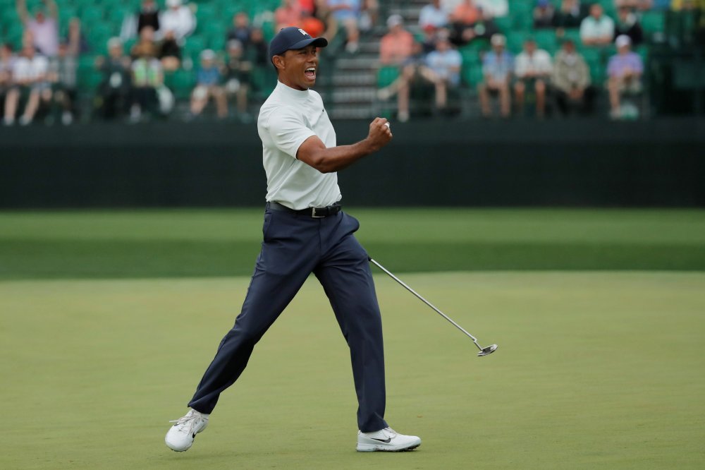 Tiger Woods celebrates a birdie putt on the 15th hole during second round play in Augusta April 12, 2019. u00e2u20acu2022 Reuters pic