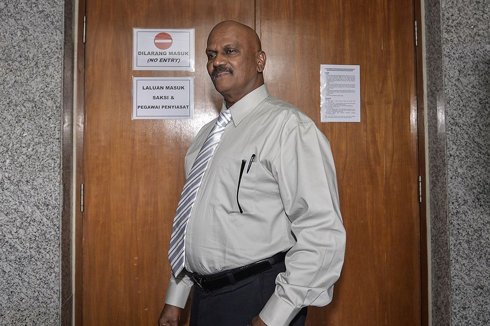 Witness DSP S. Sivanganam is pictured during the second day of the Wang Kelian Royal Commission of Inquiry (RCI) hearing in Putrajaya April 18, 2019. u00e2u20acu201d Picture by Miera Zulyana