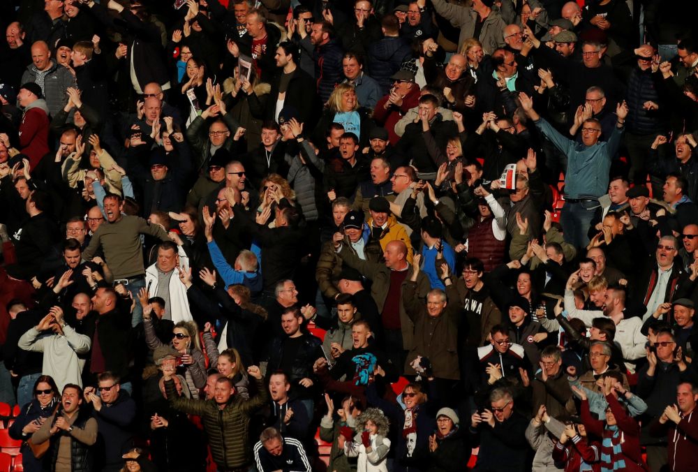 West Ham fans celebrate their first goal scored by West Ham's Felipe Anderson at Old Trafford. u00e2u20acu201d Reuters pic