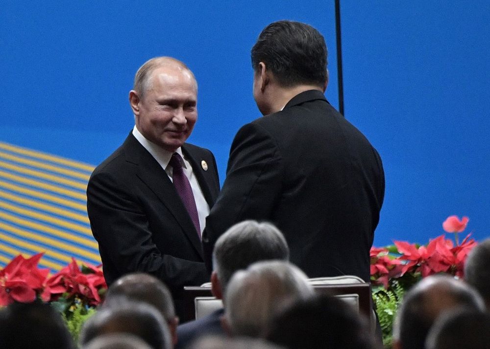 Chinau00e2u20acu2122s President Xi Jinping shakes hands with Russiau00e2u20acu2122s President Vladimir Putin during the opening ceremony of the Belt and Road Forum in Beijing in April 26, 2019. u00e2u20acu201d Sputnik/AFP pic