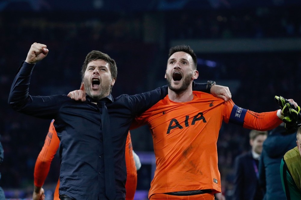 Tottenhamu00e2u20acu2122s manager Mauricio Pochettino and goalkeeper Hugo Lloris celebrate their victory at the end of the Uefa Champions League semi-final second leg match with Ajax at Johan Cruyff Arena in Amsterdam May 8, 2019. u00e2u20acu201d AFP pic