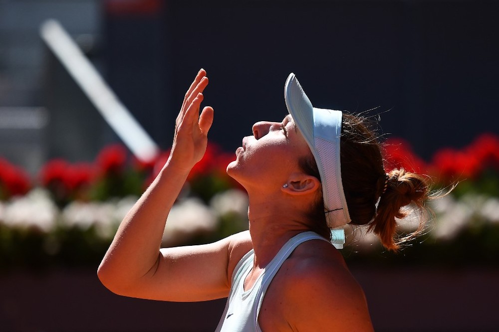 Romaniau00e2u20acu2122s Simona Halep blows a kiss to celebrate defeating Switzerlandu00e2u20acu2122s Belinda Bencic during their WTA Madrid Open semi-final match at the Caja Magica in Madrid May 10, 2019. u00e2u20acu201d AFP pic