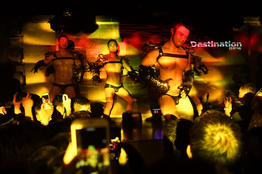 Performers dance in a gay night club in Beijing May 11, 2019. u00e2u20acu201d AFP pic