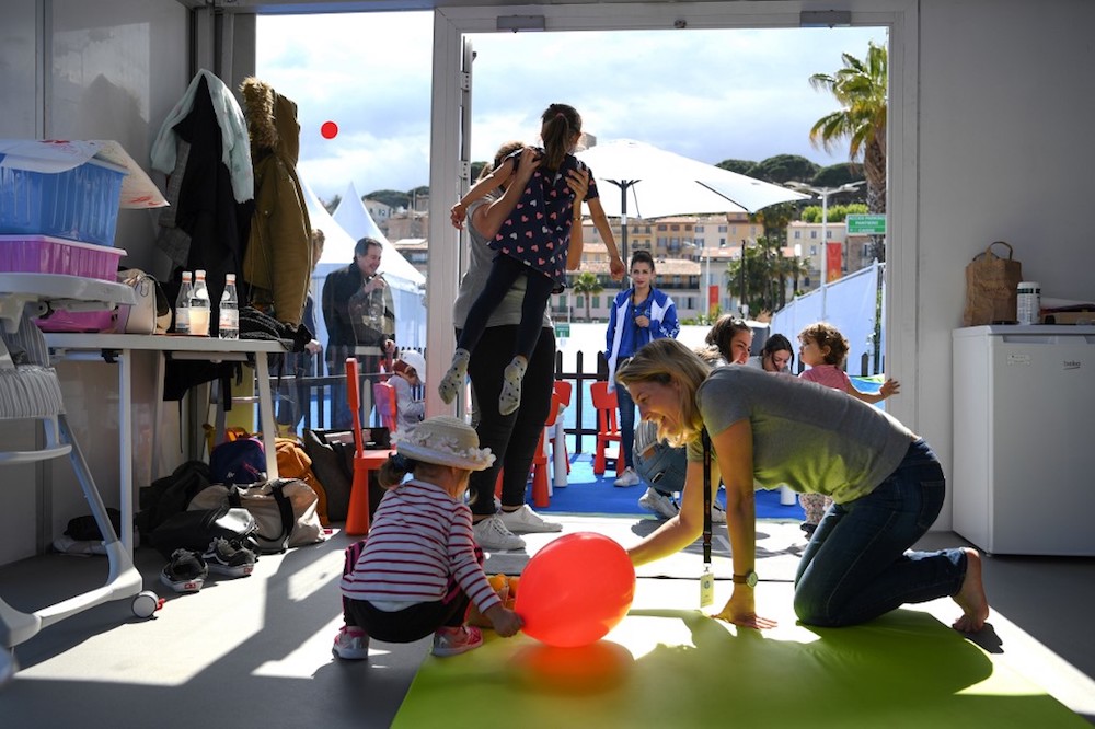Childcare assistants look for children at the festivalu00e2u20acu2122s day nursery during the 72nd edition of the Cannes Film Festival in Cannes May 15, 2019. u00e2u20acu201d AFP pic
