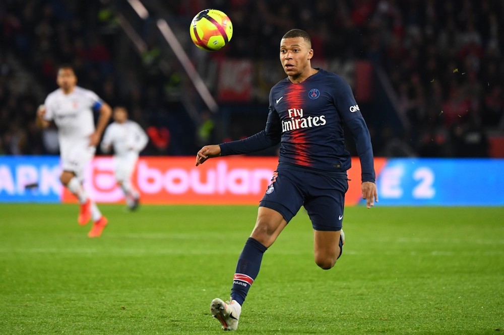 Paris Saint-Germainu00e2u20acu2122s Kylian Mbappe runs after the ball during the Ligue 1 match with Dijon at the Parc des Princes stadium in Paris May 18, 2019. u00e2u20acu201d AFP pic