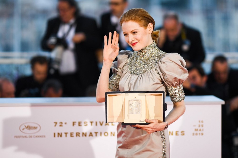 Emily Beecham poses during a photocall with her trophy after winning the Best Actress Prize for her part in u00e2u20acu02dcLittle Joeu00e2u20acu2122 at the 72nd edition of the Cannes Film Festival May 25, 2019. u00e2u20acu201d AFP pic