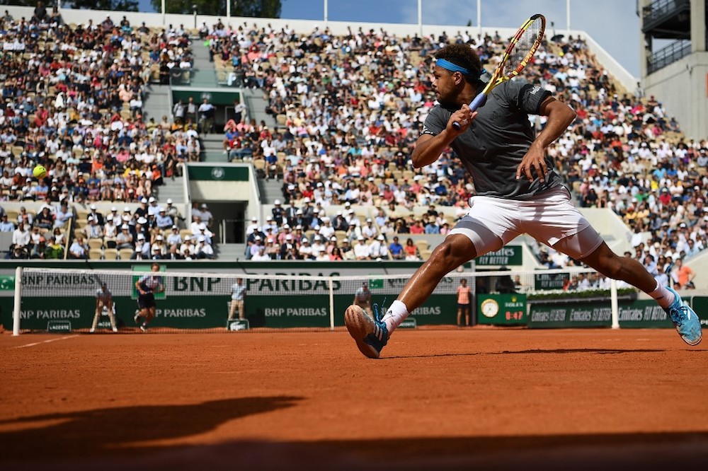 Franceu00e2u20acu2122s Jo-Wilfried Tsonga returns the ball to Germanyu00e2u20acu2122s Peter Gojowczyk during their menu00e2u20acu2122s singles first-round match at the 2019 French Open in Paris May 27, 2019. u00e2u20acu201d AFP pic