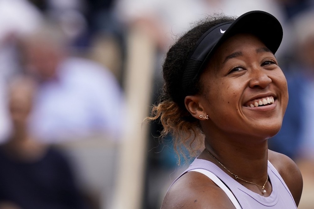 Japanu00e2u20acu2122s Naomi Osaka celebrates after winning against Belarusu00e2u20acu2122 Victoria Azarenka during their womenu00e2u20acu2122s singles second-round match at the 2019 French Open in Paris May 30, 2019. u00e2u20acu201d AFP pic