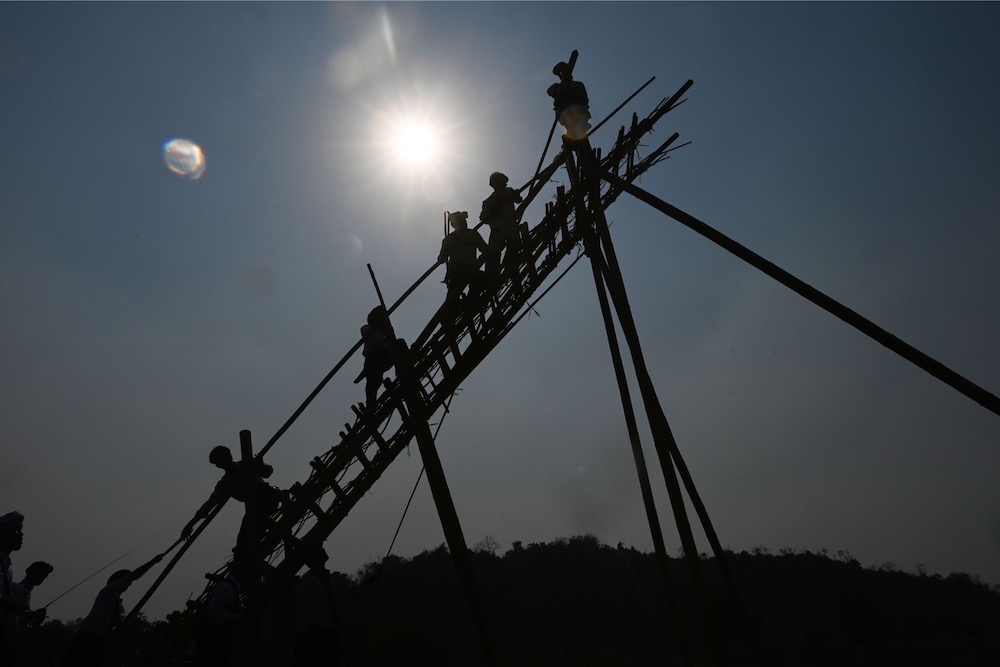 In this picture taken on April 29, 2019, Pa'O ethnic people prepare to launch a homemade rocket during a festival in Nantar, Shan state. — AFP pic