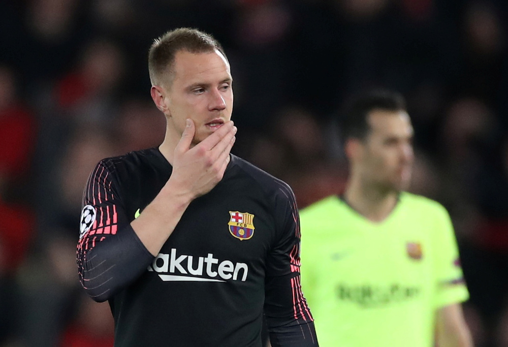 Barcelona's Marc-Andre ter Stegen and Sergio Busquets react after the match against Liverpool, May 7, 2019. u00e2u20acu201d Action Images handout via Reuters/Carl Recine