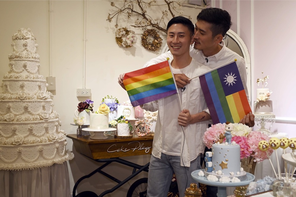 This picture taken on May 7, 2019 shows cake maker Shane Lin (left) and his lover Marc Yuan posing for a photo during an interview at their workshop Cake Play in Taipei. u00e2u20acu201d AFP pic