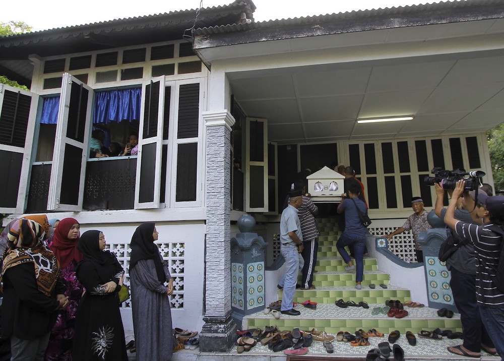 The remains of Siti Kharina Mohd Khairuddin are brought back to her familyu00e2u20acu2122s house at Kampung Tengah Seri Menanti in Kuala Pilah May 16, 2019. u00e2u20acu201d Bernama pic