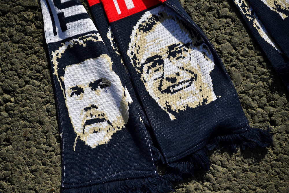 A scarf depicting Tottenham Hotspur manager Mauricio Pochettino and Liverpool manager Jurgen Klopp is seen before their Premier League match at Wembley Stadium in London September 15, 2018. u00e2u20acu201d Reuters pic