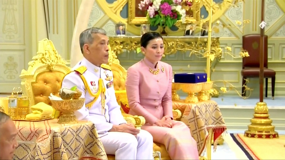 King Maha Vajiralongkorn and his consort, General Suthida Vajiralongkorn named Queen Suthida attend their wedding ceremony in Bangkok May 1, 2019. u00e2u20acu201d Screen capture from Thai TV Pool via Reuters