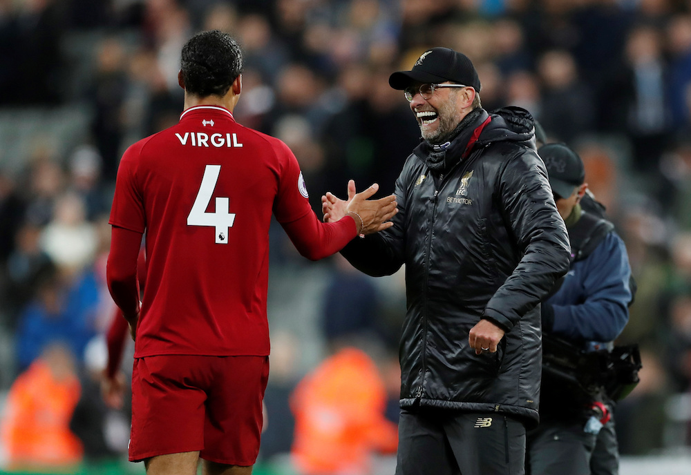 Liverpool manager Jurgen Klopp and Virgil van Dijk celebrate after the Premier League match with Newcastle United at St Jamesu00e2u20acu2122 Park in Newcastle May 4, 2019. u00e2u20acu201d Action Images pic via Reuters