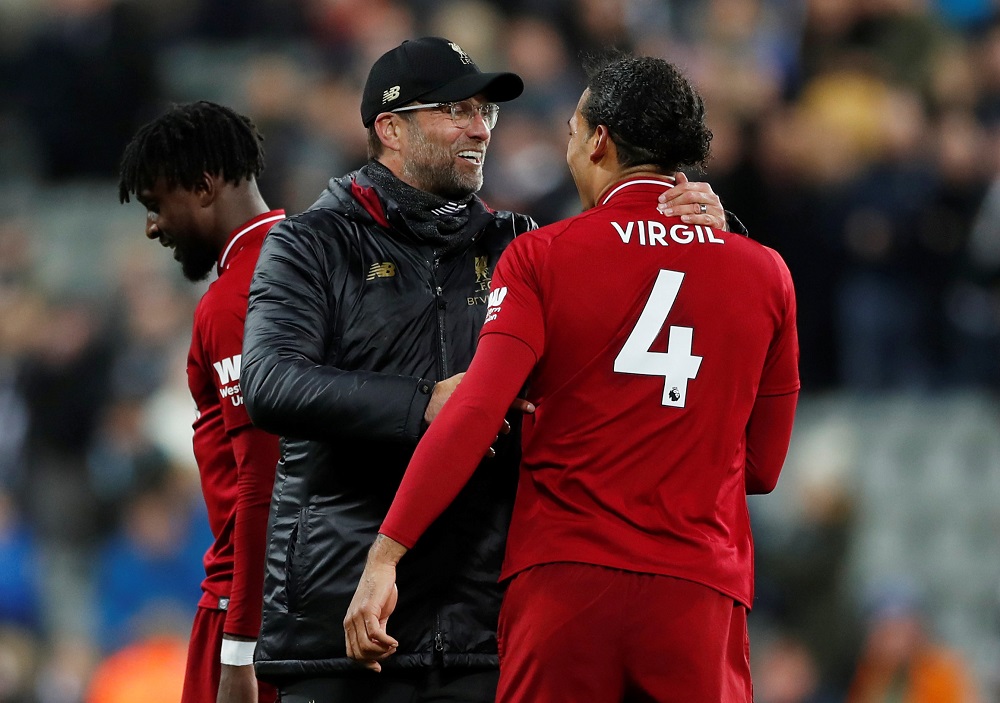 Liverpool manager Juergen Klopp and Virgil van Dijk celebrate after the match against Newcastle at St Jamesu00e2u20acu2122 Park in Newcastle May 4, 2019. u00e2u20acu201d Action Images via Reuters