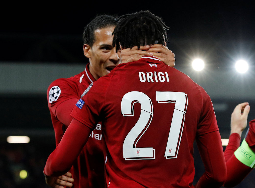 Liverpoolu00e2u20acu2122s Divock Origi celebrates scoring their fourth goal with Virgil van Dijk during their Champions League semi-final second leg match with Barcelona at Anfield in Liverpool May 7, 2019. u00e2u20acu201d Reuters pic