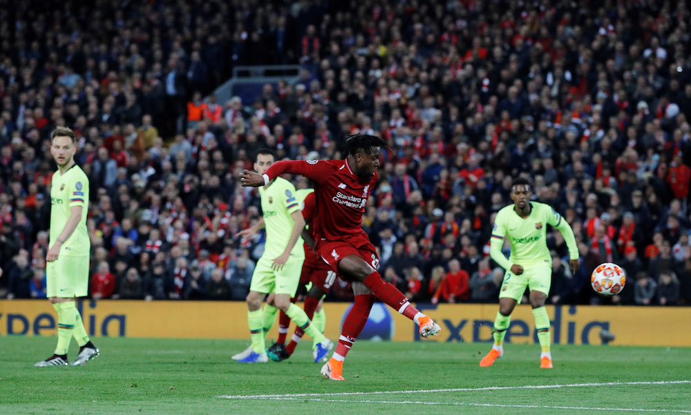 Liverpoolu00e2u20acu2122s Divock Origi scores their fourth goal during their Champions League semi-final second leg match with Barcelona at Anfield, Liverpool May 7, 2019. u00e2u20acu201d Reuters pic