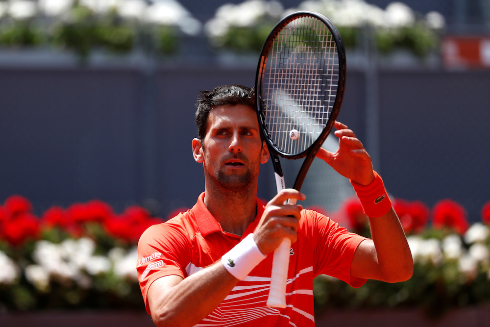 Serbiau00e2u20acu2122s Novak Djokovic celebrates winning his third-round match against Franceu00e2u20acu2122s Jeremy Chardy at the Madrid Open May 9, 2019. u00e2u20acu201d Reuters pic