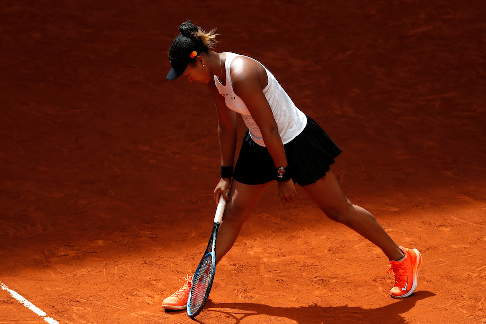 Japanu00e2u20acu2122s Naomi Osaka reacts during her quarter-final match against Switzerlandu00e2u20acu2122s Belinda Bencic during the Madrid Open May 9, 2019. u00e2u20acu201d Reuters pic