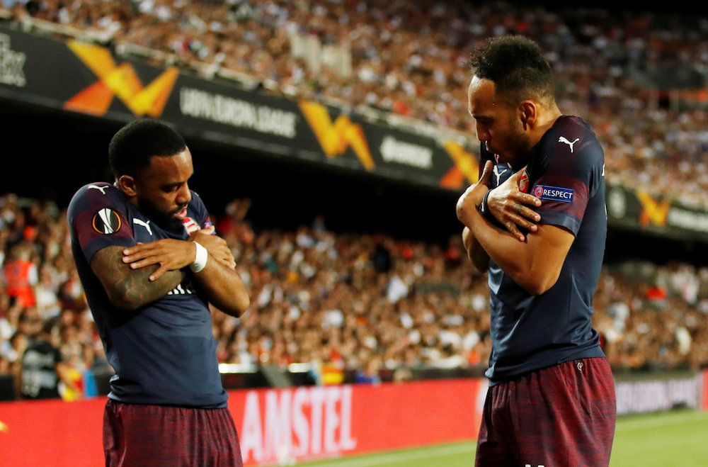 Arsenalu00e2u20acu2122s Pierre-Emerick Aubameyang celebrates scoring their first goal with Alexandre Lacazette during the Europa League semi-final second leg match with Valencia at Mestalla in Valencia May 9, 2019. u00e2u20acu201d Action Images pic via Reuters