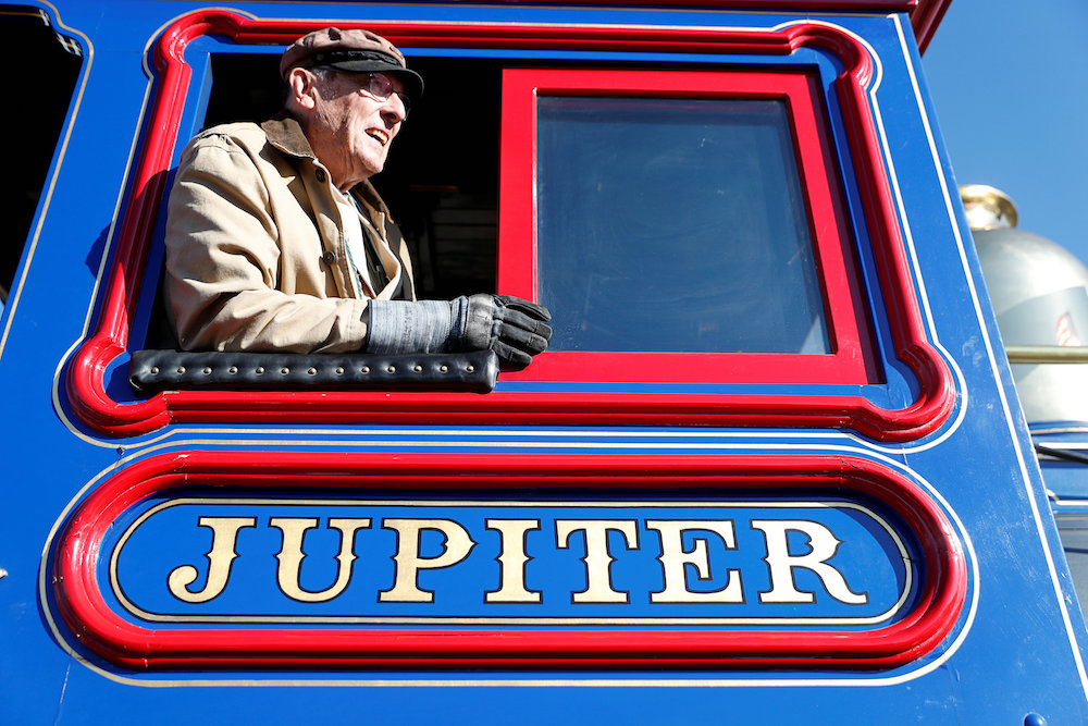 A volunteer railroad fireman for the National Park Service leans out of a replica of the Jupiter steam locomotive on the 150th anniversary of the completion of the Transcontinental Railroad in Promontory, Utah May 10, 2019. — Reuters pic