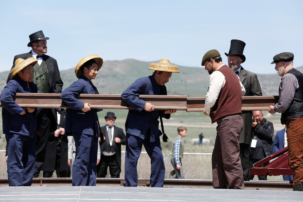 Performers play the roles of Chinese and Irish workers during a historical re-enactment on the 150th anniversary of the Transcontinental Railroad's completion at Golden Spike National Historical Park in Promontory, Utah May 10, 2019. — Reuters pic