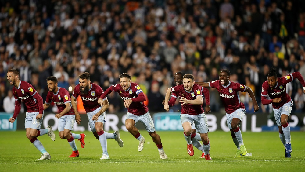 Aston Villa players celebrate after winning the penalty shootout at The Hawthorns in West Bromwich May 14, 2019. u00e2u20acu201d Action Images via Reuters 