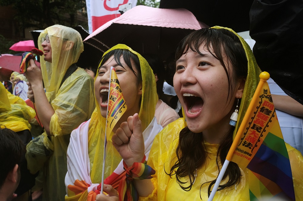 Same-sex marriage supporters shout during a parliament vote on three draft bills of a same-sex marriage law, outside the Legislative Yuan in Taipei May 17, 2019. u00e2u20acu201d Reuters pic