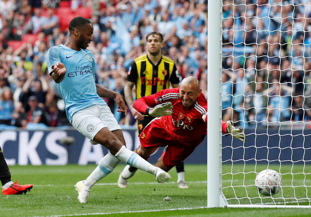 Manchester Cityu00e2u20acu2122s Raheem Sterling scores their sixth goal to complete his hat-trick during the FA Cup Final with Watford at Wembley Stadium in London May 18, 2019. u00e2u20acu201d Reuters pic 