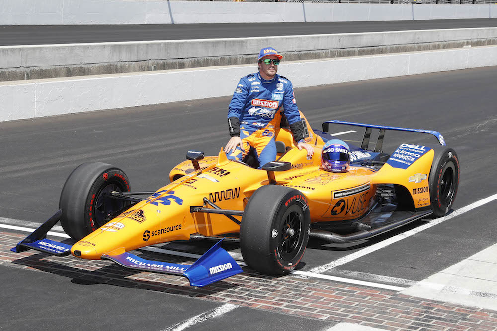 Fernando Alonso poses for a photo with his car after making a qualifying attempt for the 103rd Running of the Indianapolis 500 at Indianapolis Motor Speedway May 18, 2019. u00e2u20acu201d Brian Spurlock-USA TODAY Sports pic via Reuters