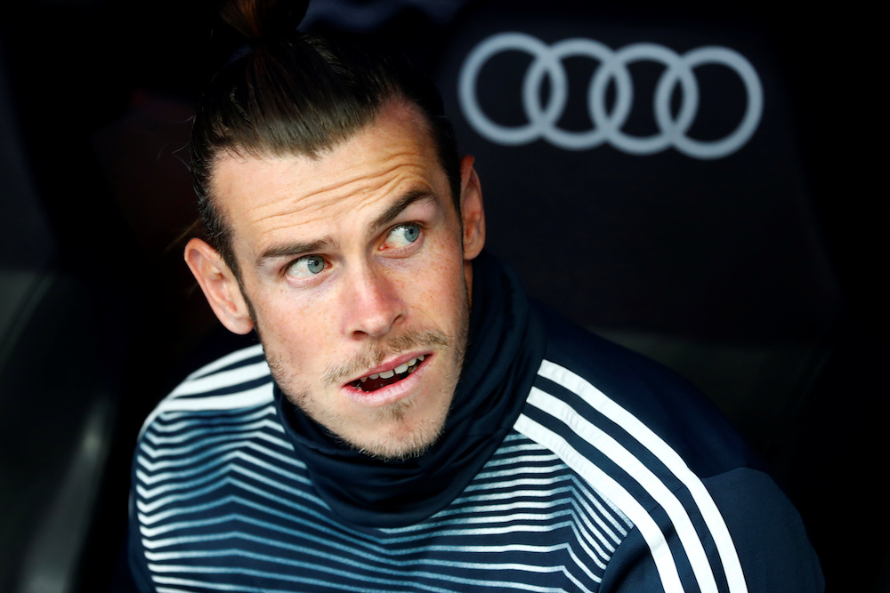 Real Madridu00e2u20acu2122s Gareth Bale looks on from the bench before the La Liga match with Real Betis at Santiago Bernabeu in Madrid May 19, 2019. u00e2u20acu201d Reuters pic