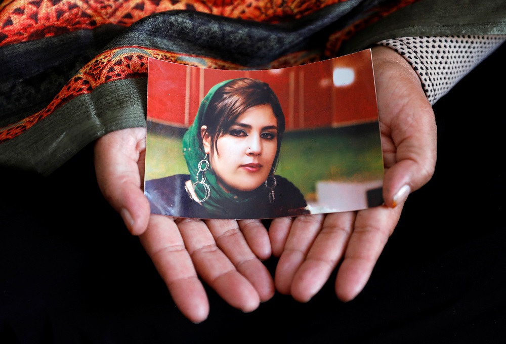Anisa Mangal holds a photo of her daughter Mena Mangal, an Afghan journalist and parliamentary adviser, who was recently killed in Kabul May 14, 2019. u00e2u20acu201d Reuters pic