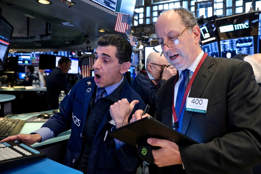Traders work on the floor at the New York Stock Exchange May 23, 2019. u00e2u20acu201d Reuters pic