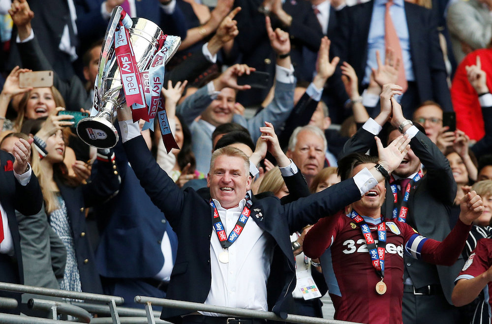 Aston Villa manager Dean Smith celebrates with the trophy after winning the Championship Playoff final with Derby County at Wembley Stadium in London May 27, 2019. u00e2u20acu201d Action Images pic via Reuters