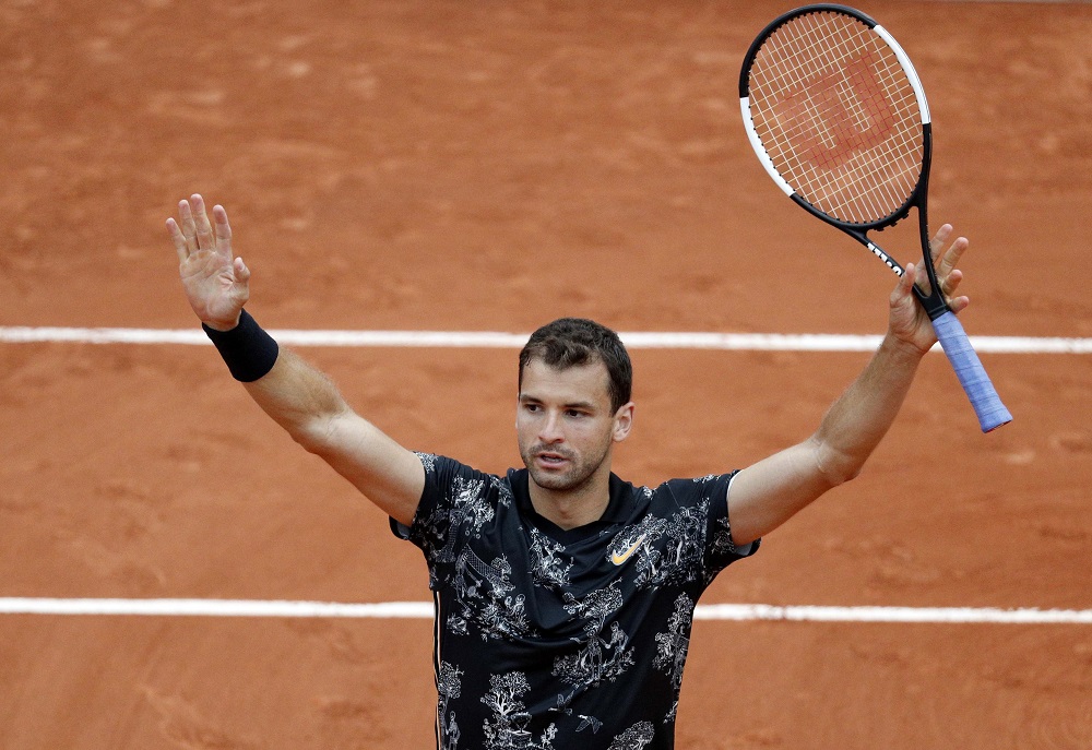 Grigor Dimitrov celebrates after winning his second round match against Marin Cilic (not pictured) in Paris May 29, 2019. u00e2u20acu201d Reuters pic