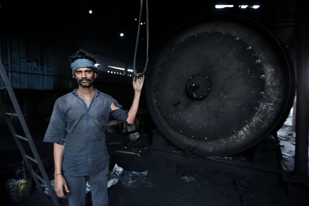 A labourer stands next to a reactor at a pyrolysis unit in Jokhabad industrial area in the northern state of Uttar Pradesh, India May 9, 2019. u00e2u20acu201d Reuters pic