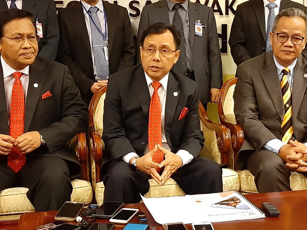 Sarawak Utilities Minister Datuk Seri Stephen Rundi (centre) speaks to reporters at the Sarawak State Assembly in Kuching May 7, 2019. u00e2u20acu201d Picture by Sulok Tawie
