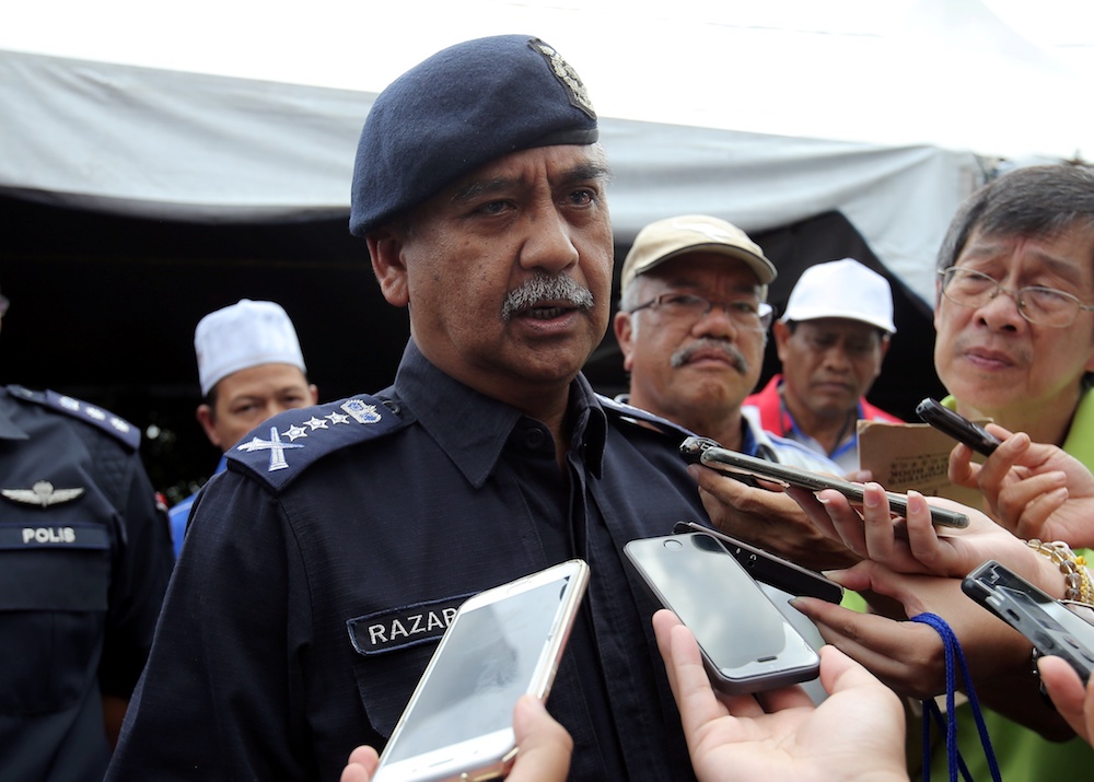 Perak police chief Datuk Razarudin Husain speaks to reporters during a visit to Medan Gopeng Ramadan Bazaar in Ipoh May 17, 2019. u00e2u20acu201d Picture by Farhan Najib