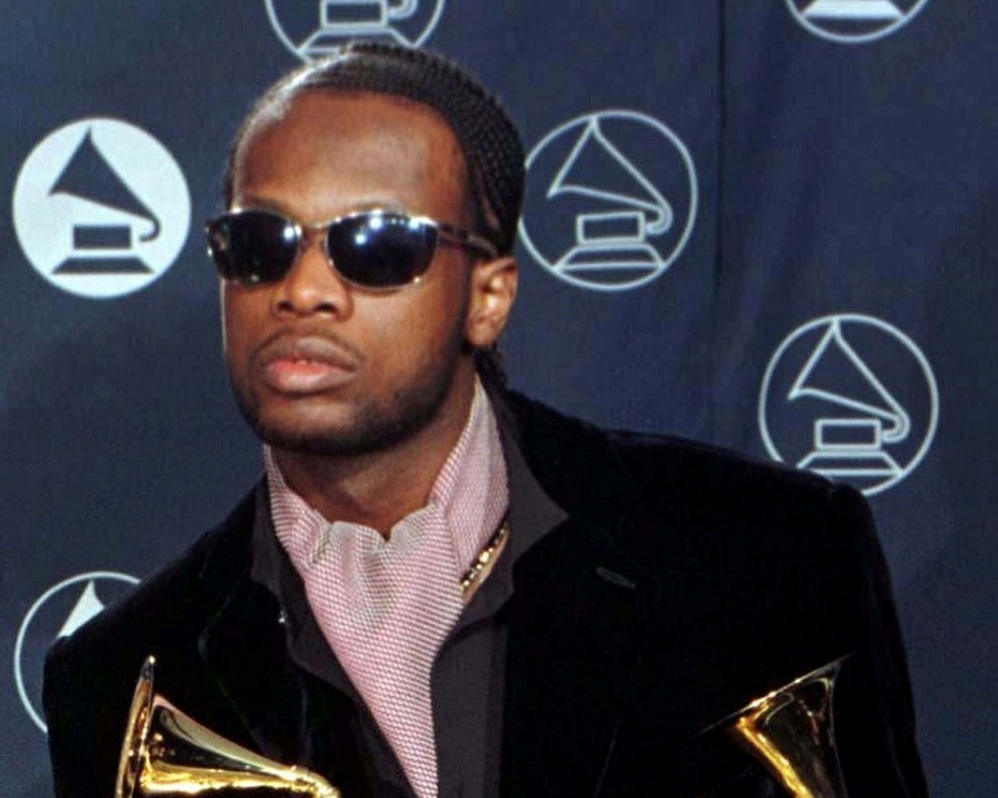 Prakazrel Michel of the band The Fugees, poses with his Grammy awards in New York  February 30, 1997.   u00e2u20acu201d Reuters pic